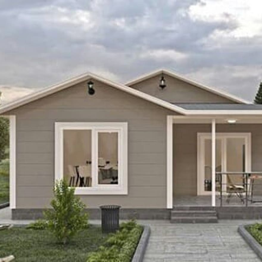 Veranda ve oturma alanı bulunan tek katlı prefabrik konut